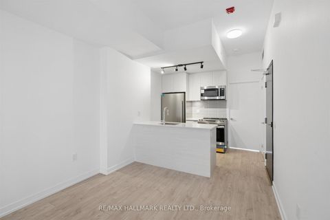 Photo 10 at 7 - 178 Clonmore Avenue, Cliffside, Toronto