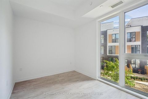 Photo 14 at 7 - 178 Clonmore Avenue, Cliffside, Toronto