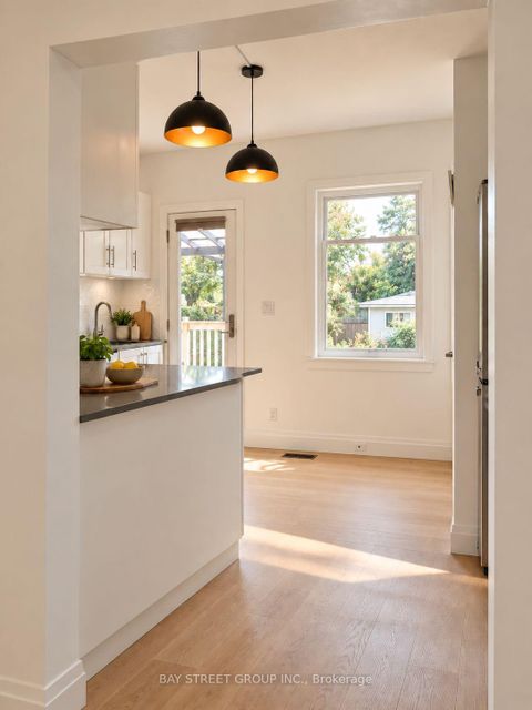 Photo 2 at 54 Thyra Avenue, Crescent Town, Toronto