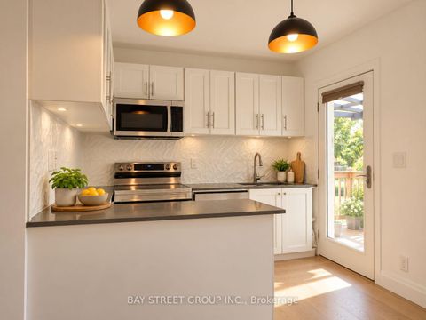 Photo 3 at 54 Thyra Avenue, Crescent Town, Toronto