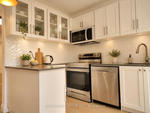 Photo 5 at 54 Thyra Avenue, Crescent Town, Toronto