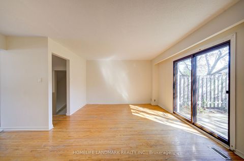 Photo 6 at 110 Purpledusk Trail, Morningside, Toronto