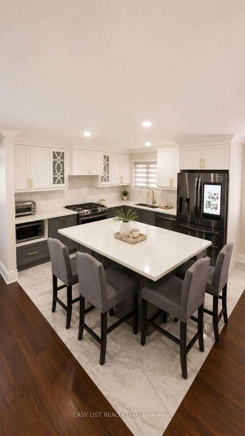 Photo 4 at 103 Fifefield Drive, Maple, Vaughan