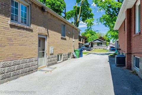 Photo 1 at 53 Savona Drive, Alderwood, Toronto
