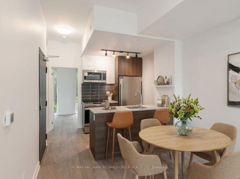 Photo 1 at 3 - 168 Clonmore Drive, Cliffside, Toronto