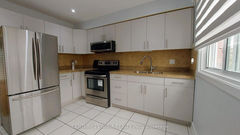 Photo 7 at 143 Purpledusk Trail, Morningside, Toronto