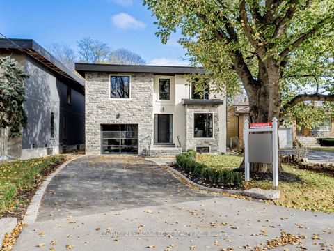 Photo 1 at 19 DONALDA Crescent, Malvern West, Toronto