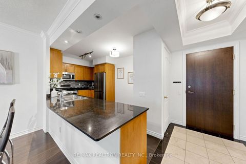 Photo 11 at 211 - 18 William Carson Crescent, Windfields, Toronto