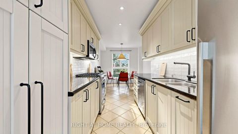 Photo 9 at 40 Snowshoe Mill Way, Windfields, Toronto