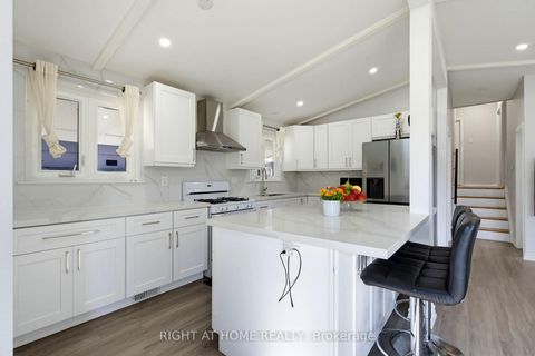Photo 7 at 75 Bloomington Crescent, Black Creek, Toronto