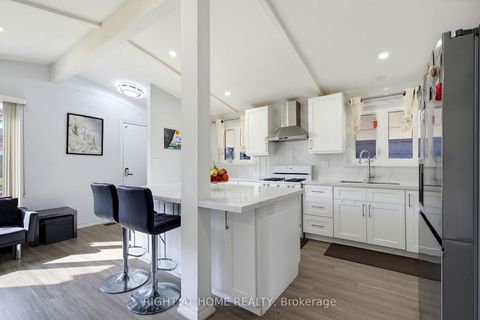Photo 8 at 75 Bloomington Crescent, Black Creek, Toronto