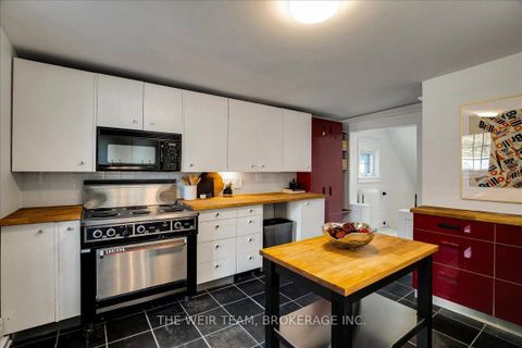 Photo 7 at 1394 Queen Street E, Coxwell, Toronto