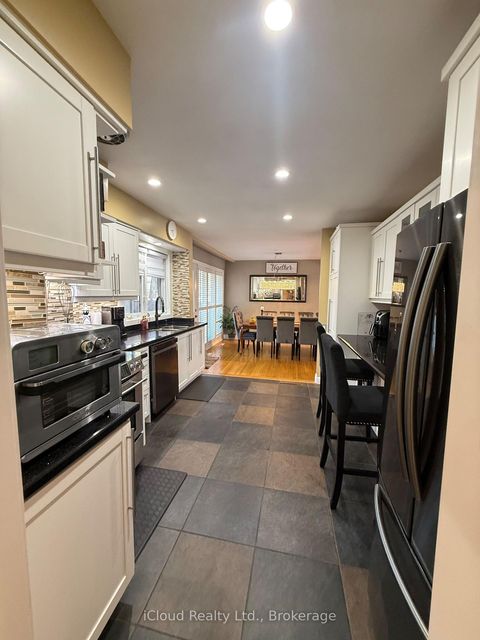 Photo 10 at 75 Walwyn Avenue, Pelmo Park W4, Toronto