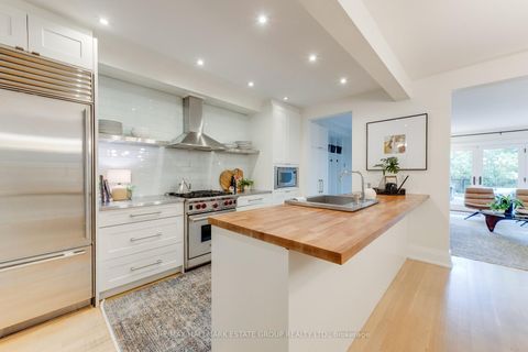 Photo 11 at 36 Courcelette Road, Cliffside, Toronto