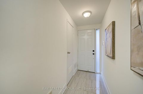 Photo 2 at 20 - 33 Dundalk Drive, Dorset Park, Toronto