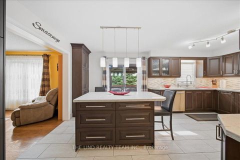 Photo 10 at 103 Allenvale Drive, Aurora Highlands, Aurora
