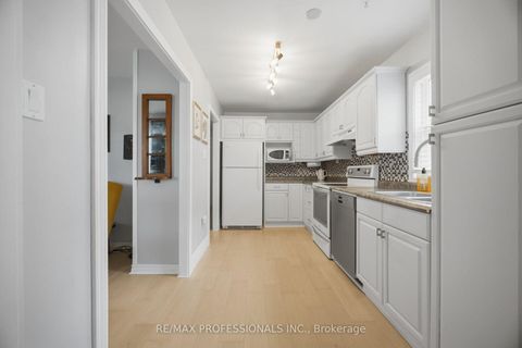 Photo 4 at 8 Smith Crescent, Queensway, Toronto