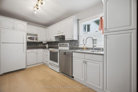 Photo 7 at 8 Smith Crescent, Queensway, Toronto