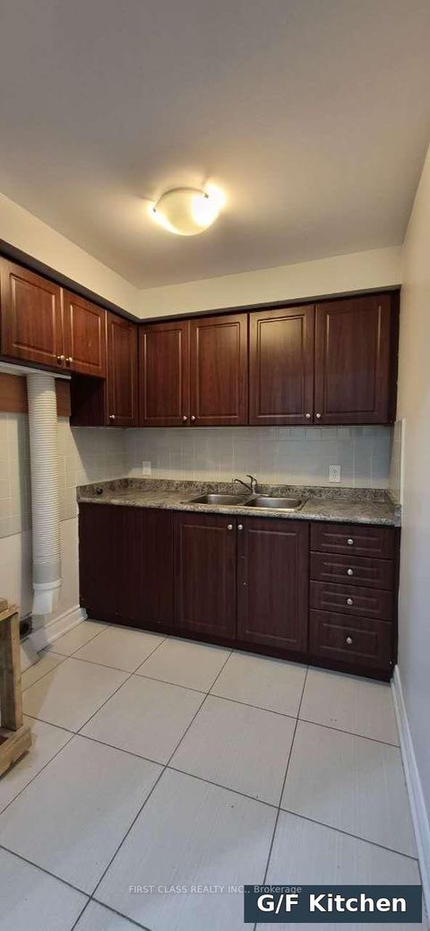 Photo 3 at 301 Rhodes Avenue, Coxwell, Toronto