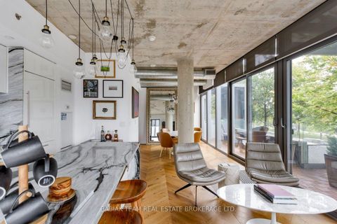 Photo 2 at TH 209 - 20 Trolley Crescent, Moss Park, Toronto