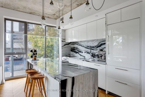 Photo 9 at TH 209 - 20 Trolley Crescent, Moss Park, Toronto