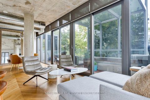 Photo 10 at TH 209 - 20 Trolley Crescent, Moss Park, Toronto