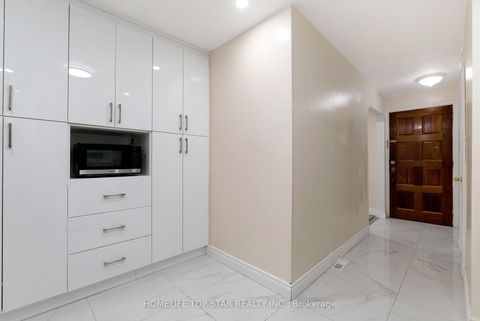 Photo 3 at 19 Treverton Drive, Kennedy Park, Toronto