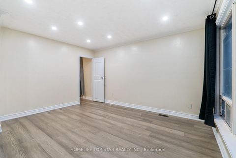 Photo 8 at 19 Treverton Drive, Kennedy Park, Toronto