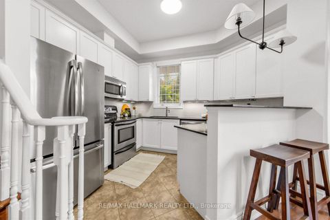 Photo 9 at 34 Fairhead Mews, Danforth, Toronto