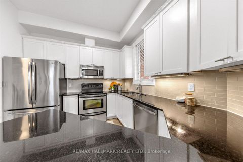 Photo 11 at 34 Fairhead Mews, Danforth, Toronto
