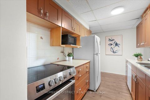Photo 12 at 404 - 3420 Eglinton Avenue E, Scarborough Village, Toronto