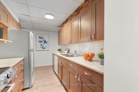 Photo 13 at 404 - 3420 Eglinton Avenue E, Scarborough Village, Toronto