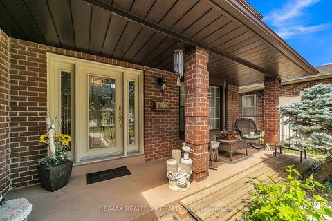Photo 2 at 114 Golf Links Drive S, Aurora Highlands, Aurora