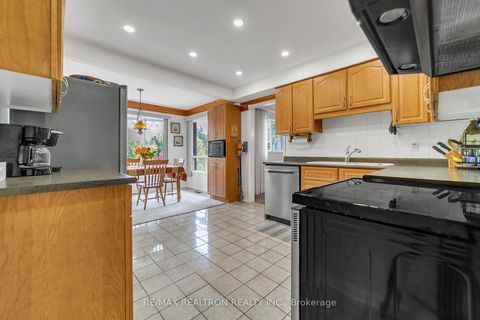 Photo 13 at 114 Golf Links Drive S, Aurora Highlands, Aurora