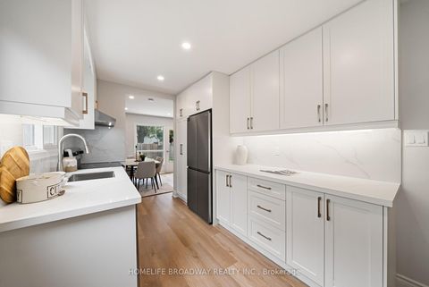Photo 7 at 44 Hollyberry Trail, Hillcrest Village, Toronto