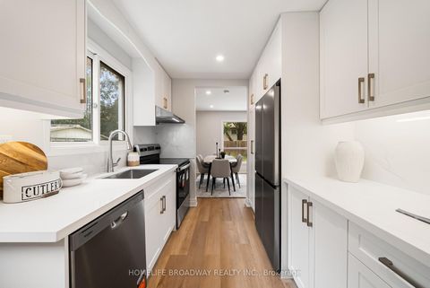 Photo 8 at 44 Hollyberry Trail, Hillcrest Village, Toronto