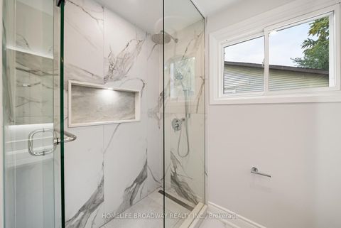 Photo 19 at 44 Hollyberry Trail, Hillcrest Village, Toronto