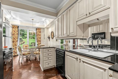 Photo 11 at 102 - 11 William Carson Crescent, Windfields, Toronto