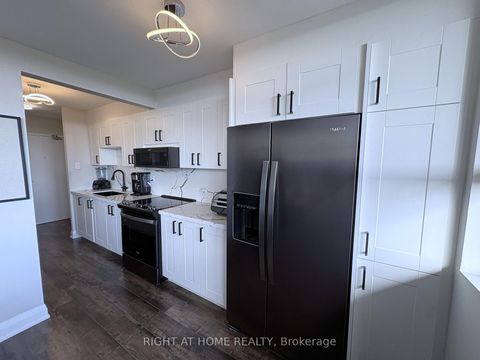 Photo 2 at 711 - 1950 Kennedy Road, Dorset Park, Toronto