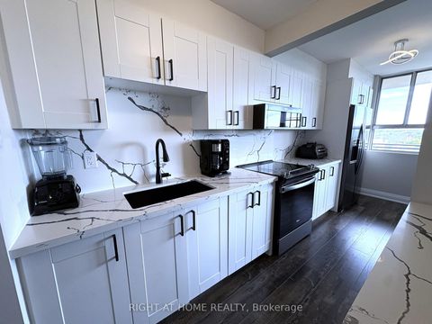 Photo 4 at 711 - 1950 Kennedy Road, Dorset Park, Toronto